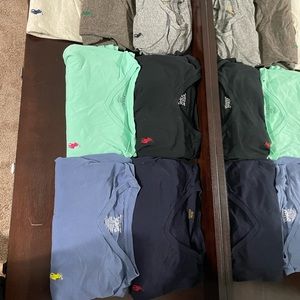 Mens v neck polo shirts size medium. Worn but great condition. 7 total